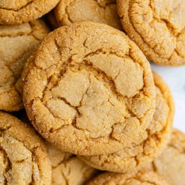 Freshly baked chewy brown sugar cookies on a cooling rack