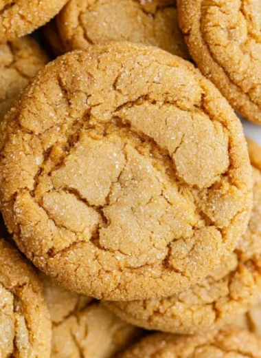 Freshly baked chewy brown sugar cookies on a cooling rack