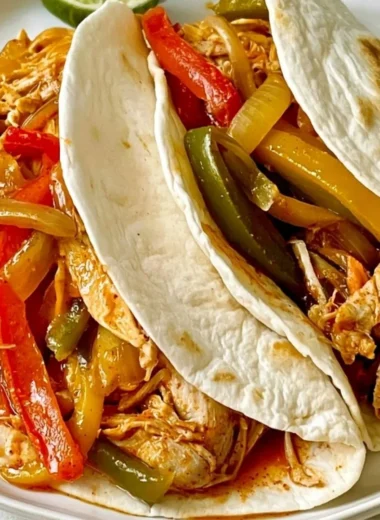 Slow Cooker Chicken Fajitas with colorful peppers and onions