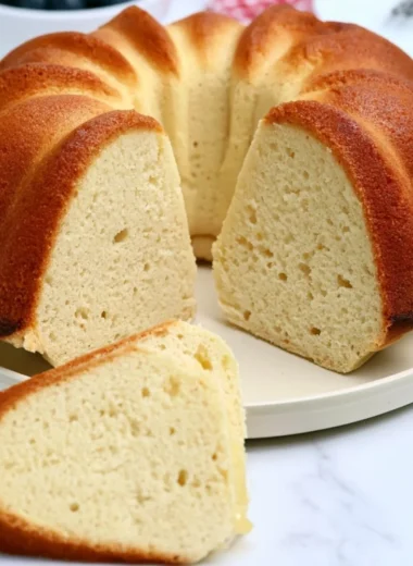 Delicious homemade Million Dollar Pound Cake on a rustic table