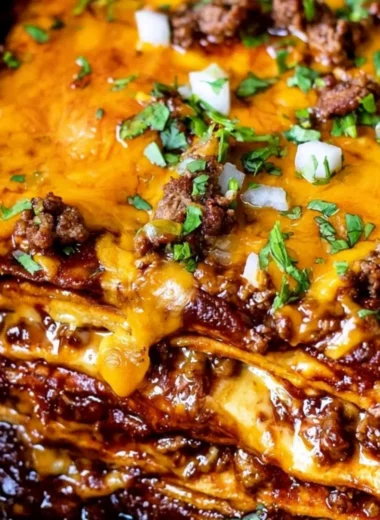 Cheesy Beef Enchilada Casserole with ground beef, cheese, and red enchilada sauce
