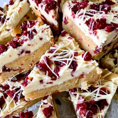 Homemade Starbucks copycat Cranberry Bliss Bars on a plate