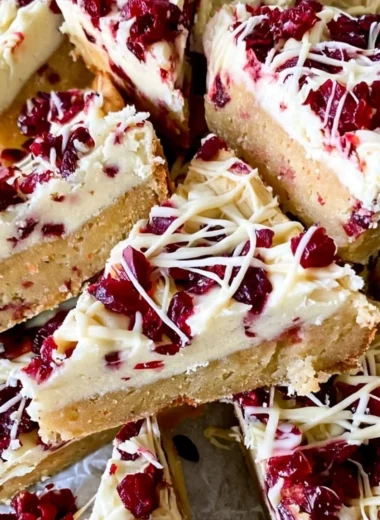 Homemade Starbucks copycat Cranberry Bliss Bars on a plate