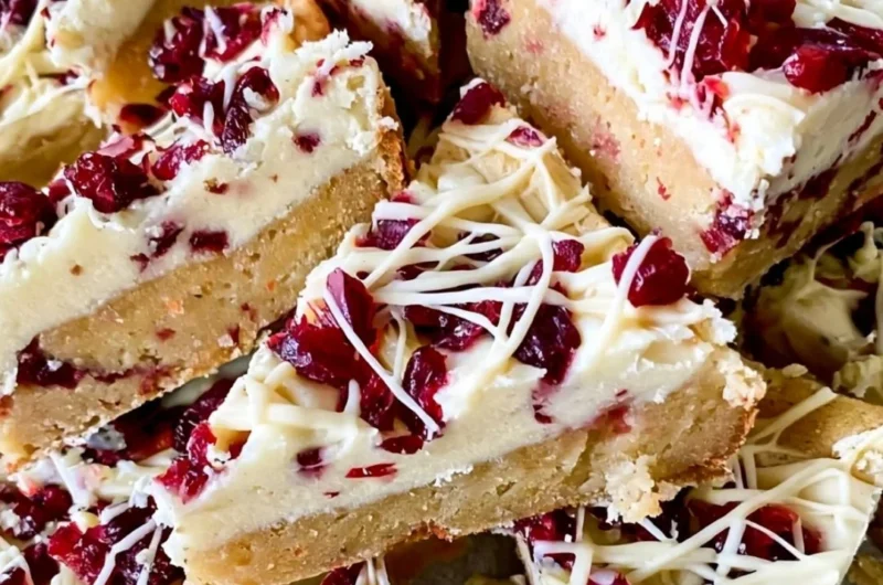 Homemade Starbucks copycat Cranberry Bliss Bars on a plate